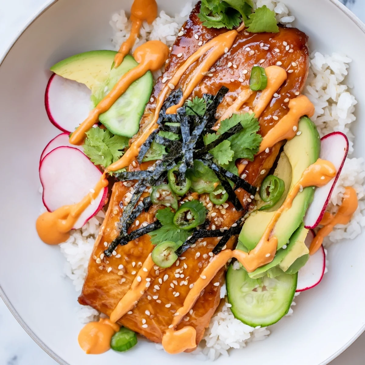 A vibrant bowl of Teriyaki Salmon Rice Taco Bowls with Pickled Veggies, topped with creamy avocado slices.