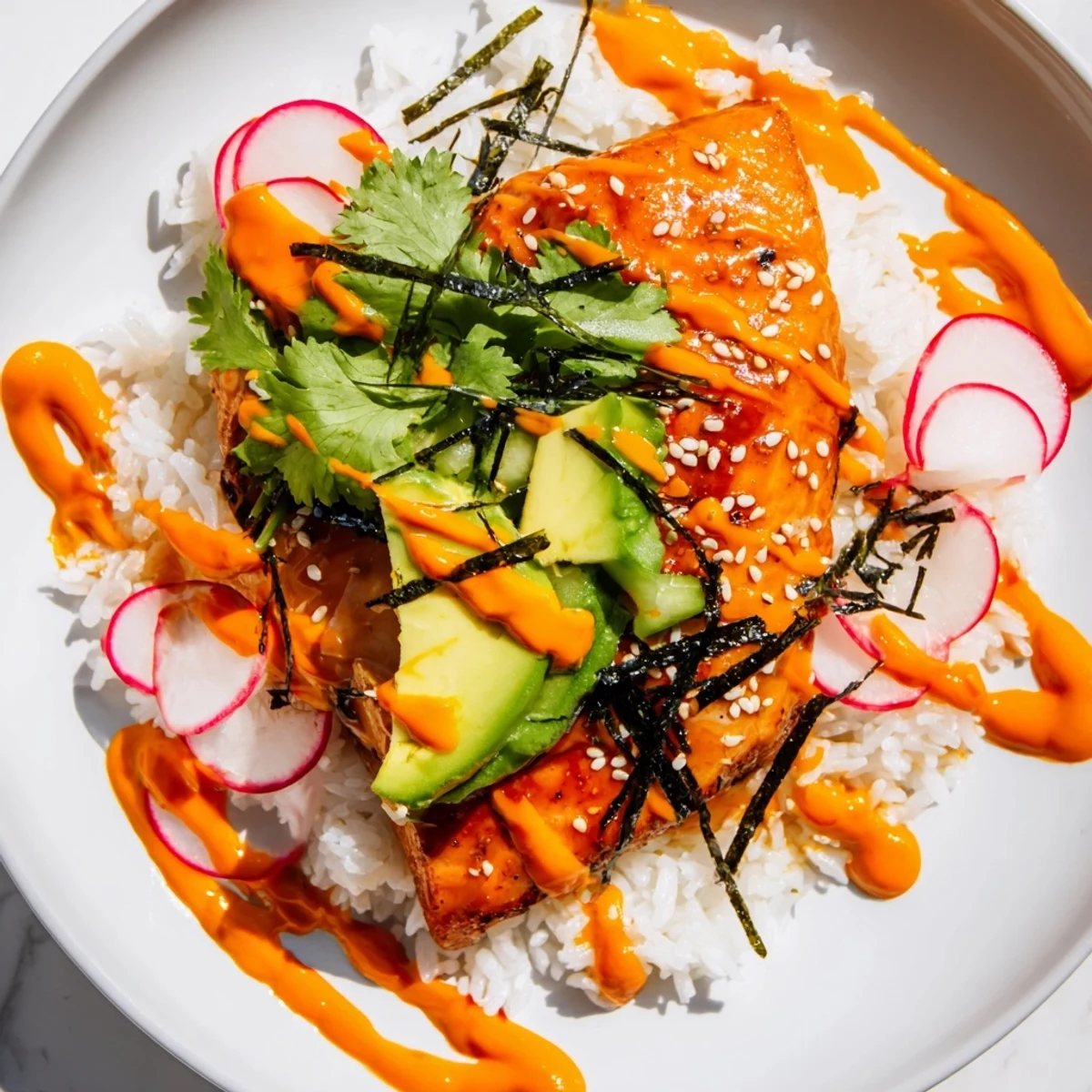 Serve these Teriyaki Salmon Rice Taco Bowls with Pickled Veggies drizzled in spicy sriracha mayo for dinner.