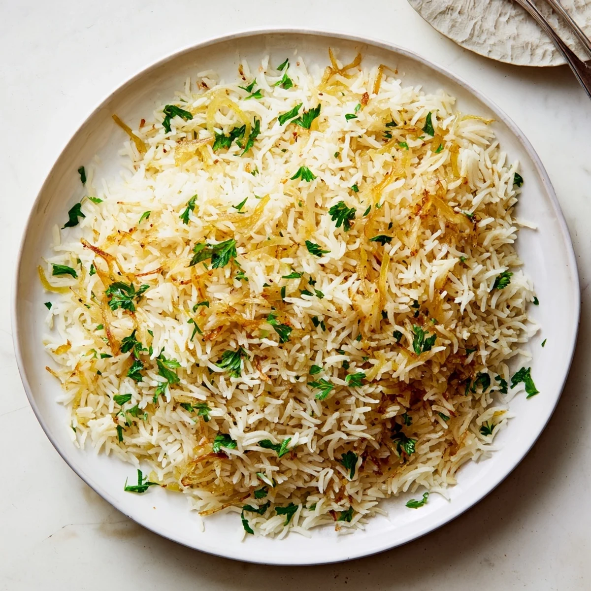 Fluffy French onion butter rice featuring tender grains and rich golden onion pieces