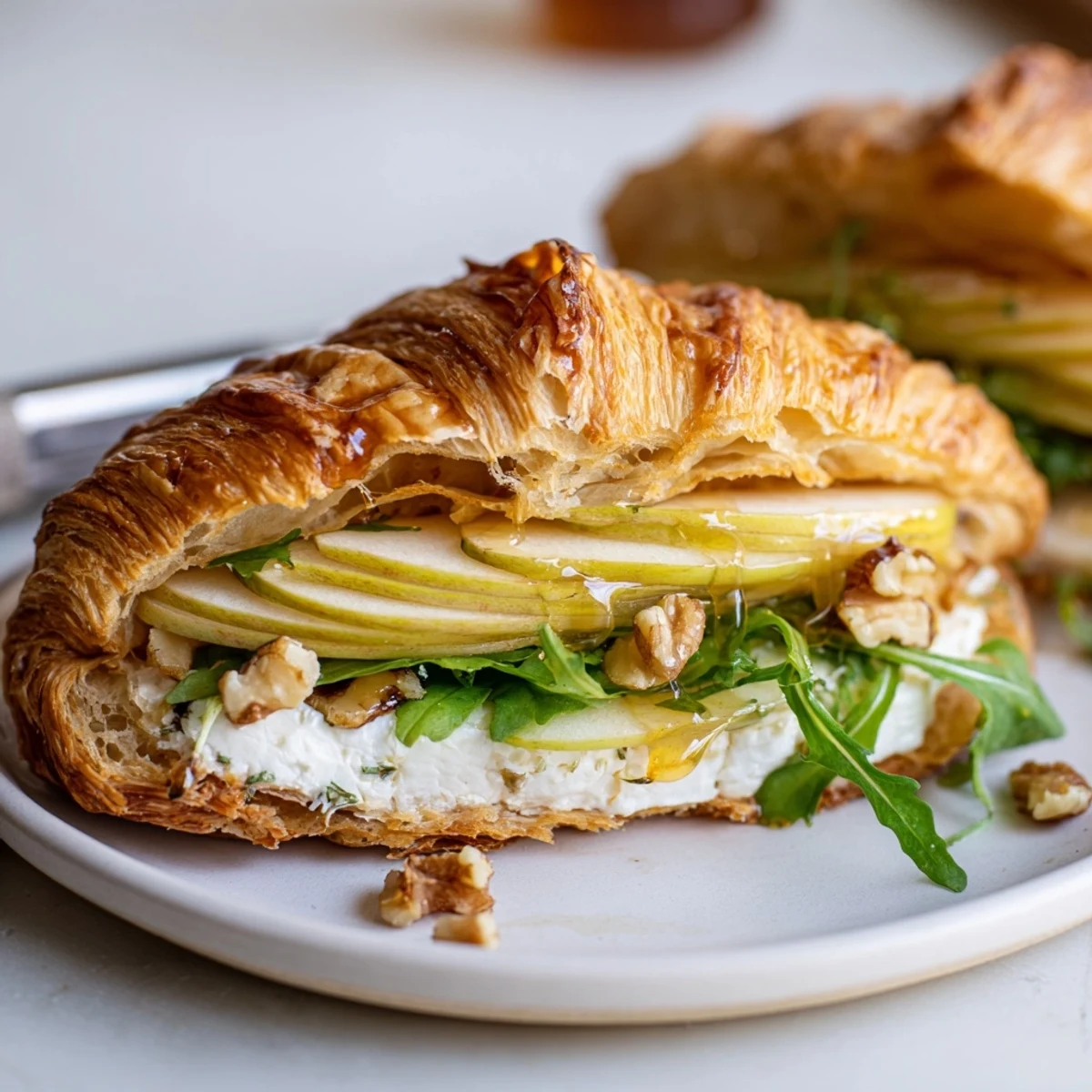 Apple Goat Cheese Croissant Sandwich Recipe: creamy goat cheese, crunchy walnuts, perfect picnic lunch