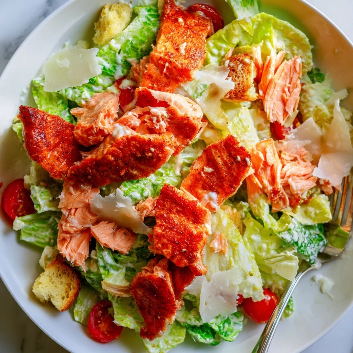 Smoky Salmon Caesar Salad with flaky roasted salmon, crisp romaine, bright lemon.