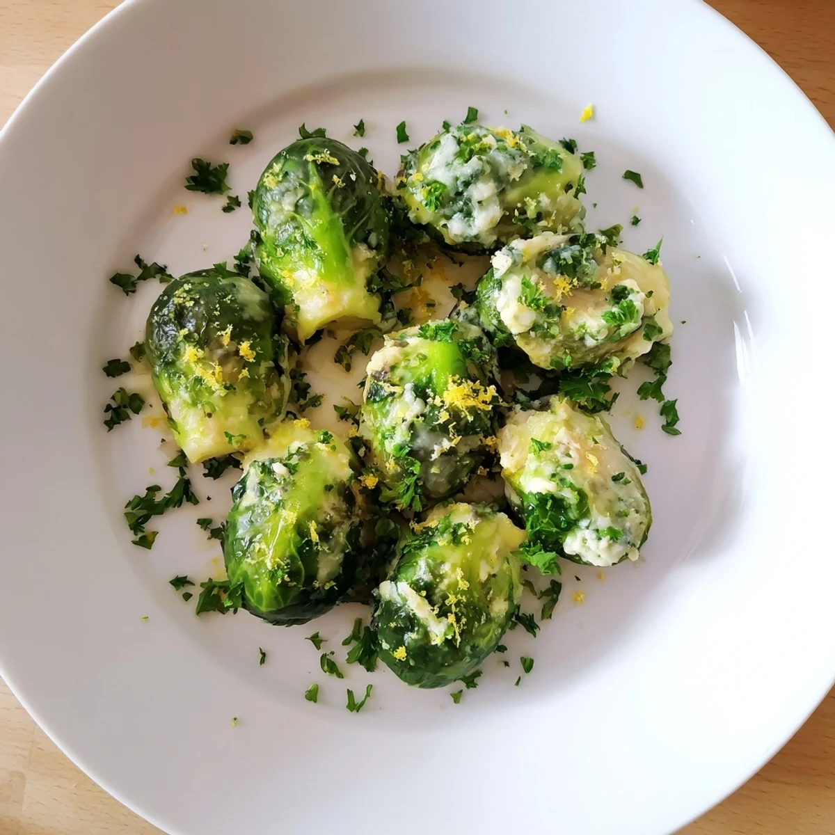 Golden tender Brussels sprouts coated in melted creamy Boursin cheese sauce