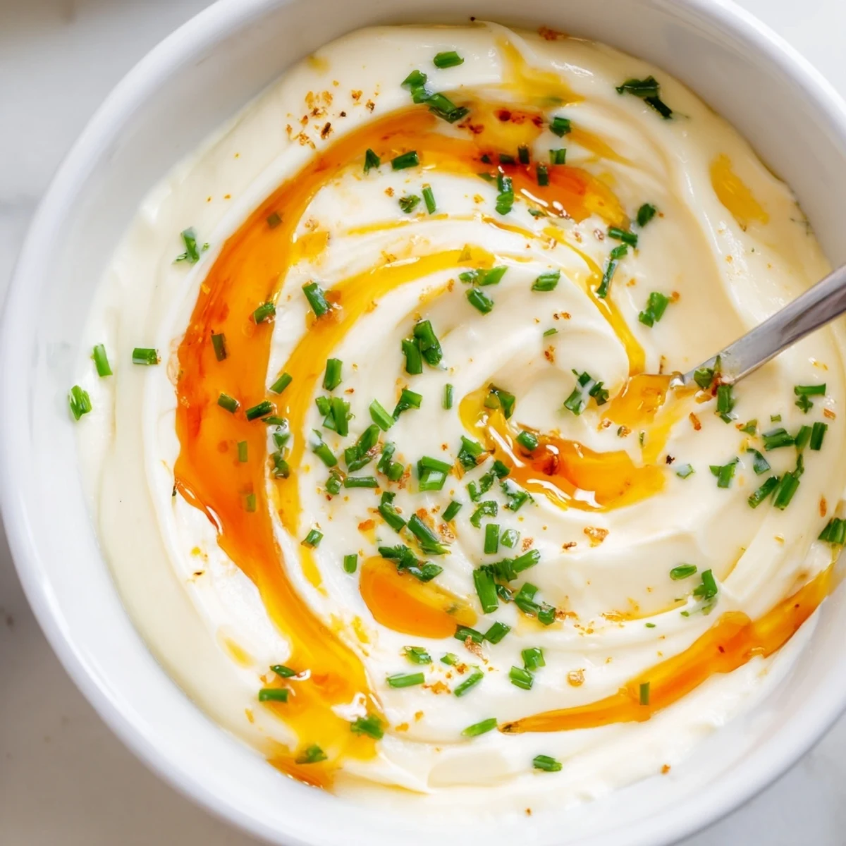Tangy Hot Honey Ranch Dip made with sour cream, ideal with fries.