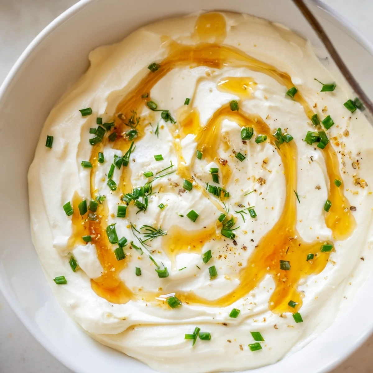 Chilled Hot Honey Ranch Dip glistening, smoky paprika aroma, perfect for wings.  