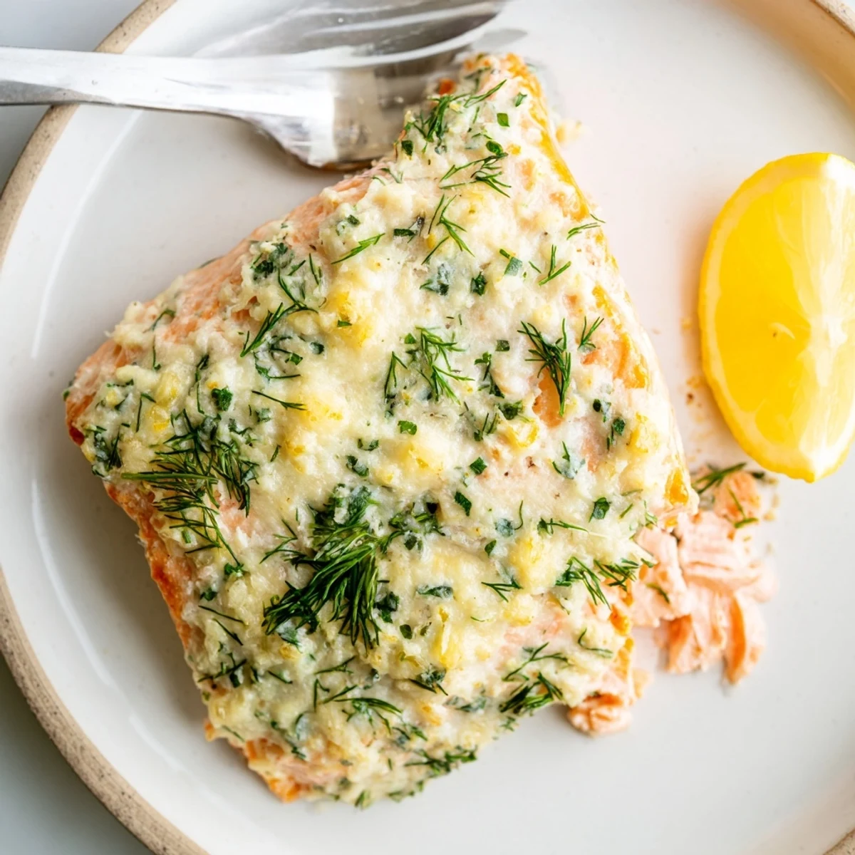 Tender baked Boursin salmon glistening with garlic herb cheese and bright lemon zest